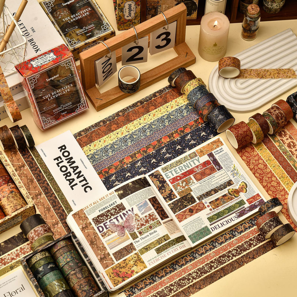 Wide oriental washi tape applied as a collage base in a vintage journal spread