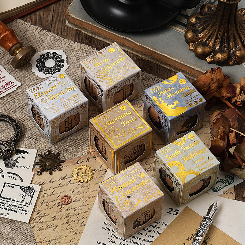 Detailed view of wooden stamp impressions and packaging
