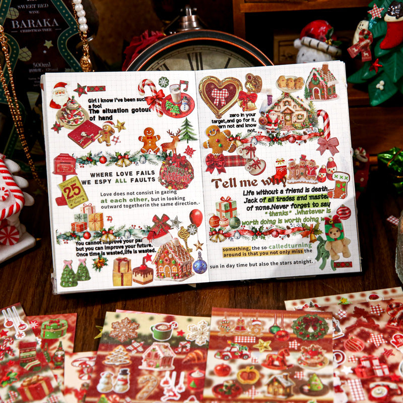 Open Christmas sticker book showing glitter-sand sticker sheets with holiday treats and gift designs
