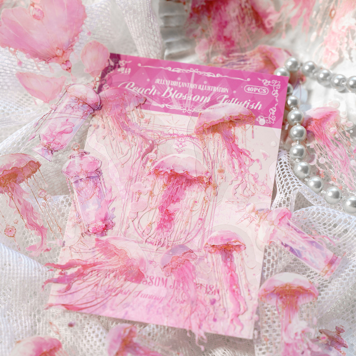 Pink jellyfish sticker pack arranged with dried flowers and pearls