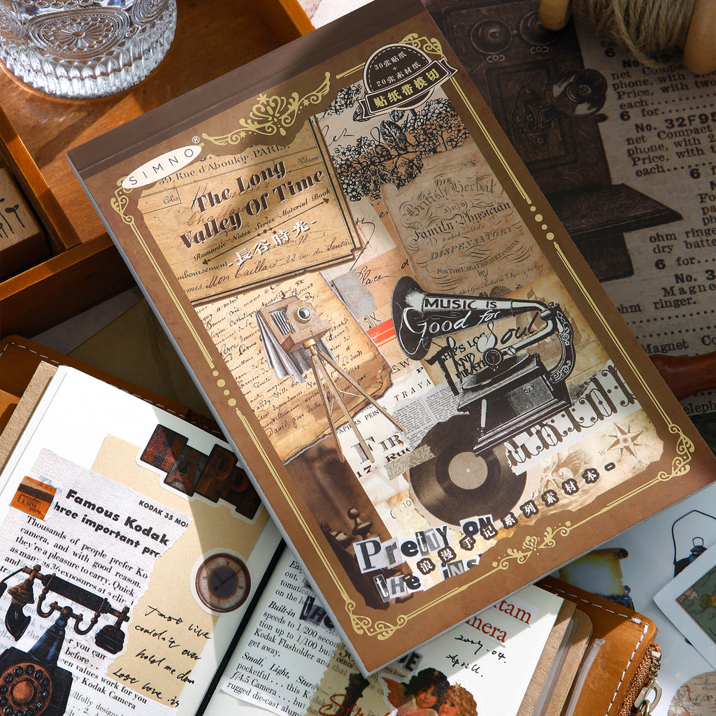 Detailed view of vintage journal paper artistic designs for collage and mixed media projects
