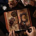 Vintage junk journal spread decorated with the collage kit - castle and clock PET stickers, antique map paper, ornate frame cutout and quote scroll