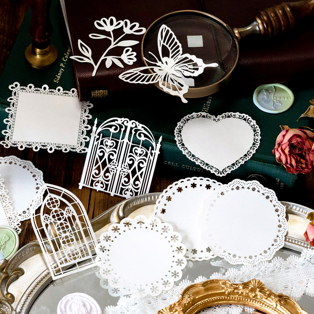  White lace cutout embellishments with butterfly, heart, and window designs for planner decoration