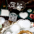  White lace cutout embellishments with butterfly, heart, and window designs for planner decoration