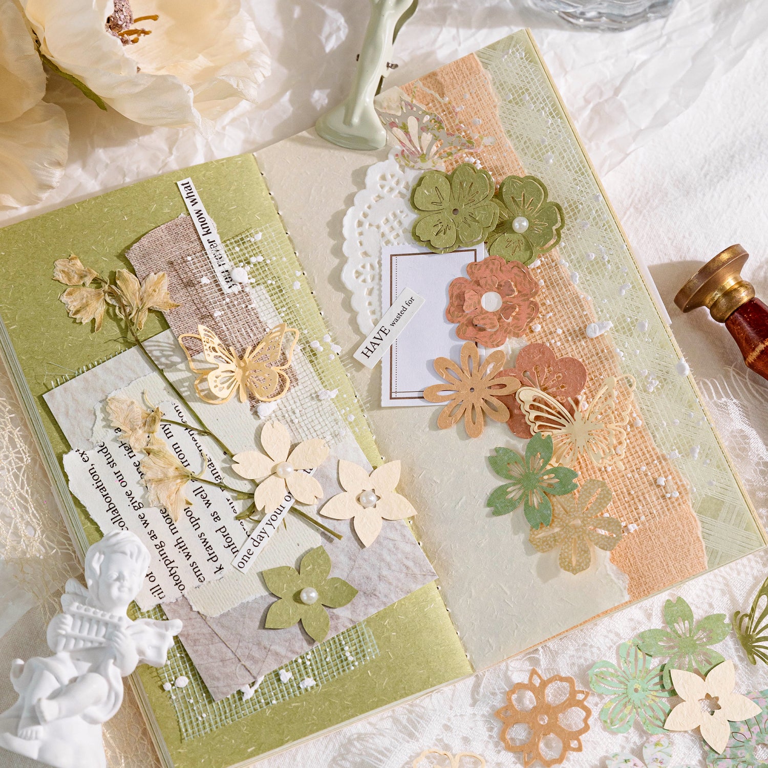 Close-up of intricate laser-cut floral die cuts and butterfly embellishments