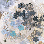 Delicate butterfly and floral die-cut paper pieces for planner decoration