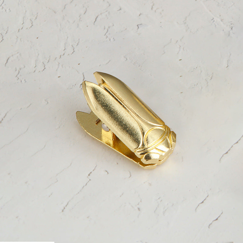 Single Luminous Gold vintage cicada metal journal clip. A heavy-duty aesthetic desk accessory perfect for holding chunky junk journals flat.