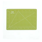 Matcha green A5 self-healing cutting mat with printed grid and angle guides