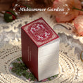 Midsummer Garden vintage collector's mini ephemera sourcebook with red coated paper cover and matte film finish, 360 sheets of lightweight paper and sulfate overlays for planner ephemera supplies
