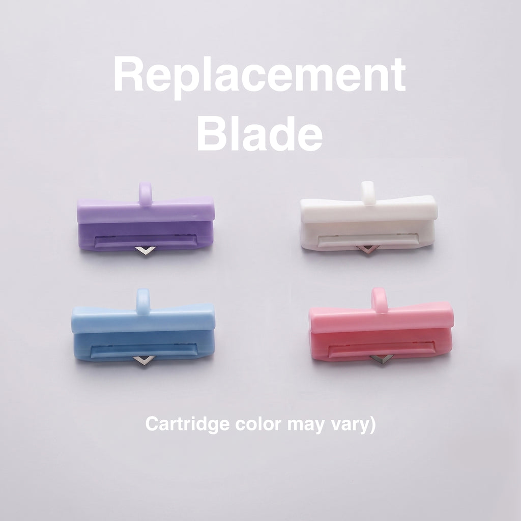 Mini paper trimmer top down view four pastel colors purple white blue pink grid-lined base scrapbooking tool