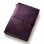 Mystic Plum thick full-grain leather writing journal in A5 size, detailed with an antique Native American chief metal charm.