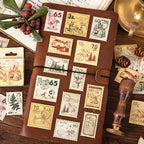 Close-up of vintage stamp sticker cube showing nature-themed postal stamp designs