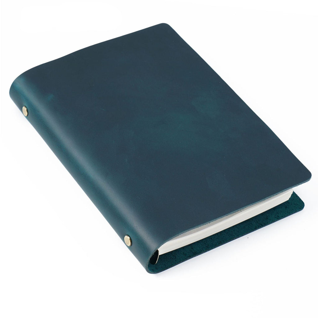 Navy blue crazy horse leather A5 notebook with brass ring binder and vintage patina cover.