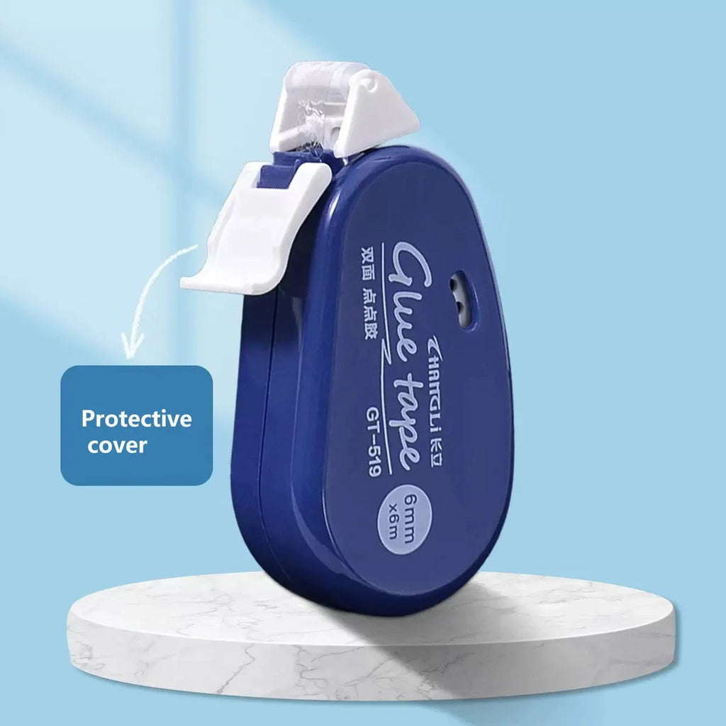 Navy blue glue tape roller standing on display with protective flip cap labeled