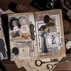 An open junk journal spread decorated with vintage character stickers, a black rose, mesh fabric, ephemera labels, and timeworn newspaper clippings on kraft paper.