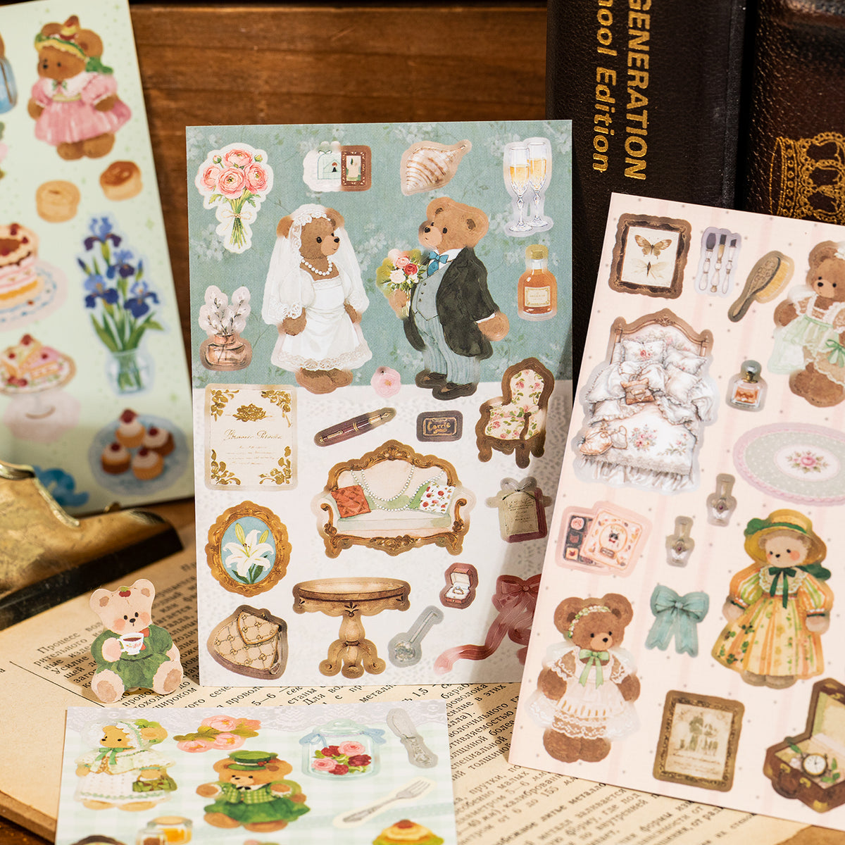Open teddy bear sticker book showing inner sheets with bear and teacup motifs