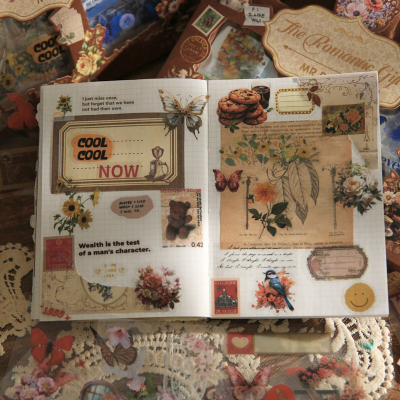 Image of opened Vintage Romantic Sticker Gift Box interior showing vintage ephemera collage design with butterfly, rose, and handwritten label stickers on cream paper
