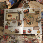 Image of opened Vintage Romantic Sticker Gift Box interior showing vintage ephemera collage design with butterfly, rose, and handwritten label stickers on cream paper
