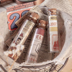 Portable pocket sticker book with retro vintage designs ideal for travel journals and planners
