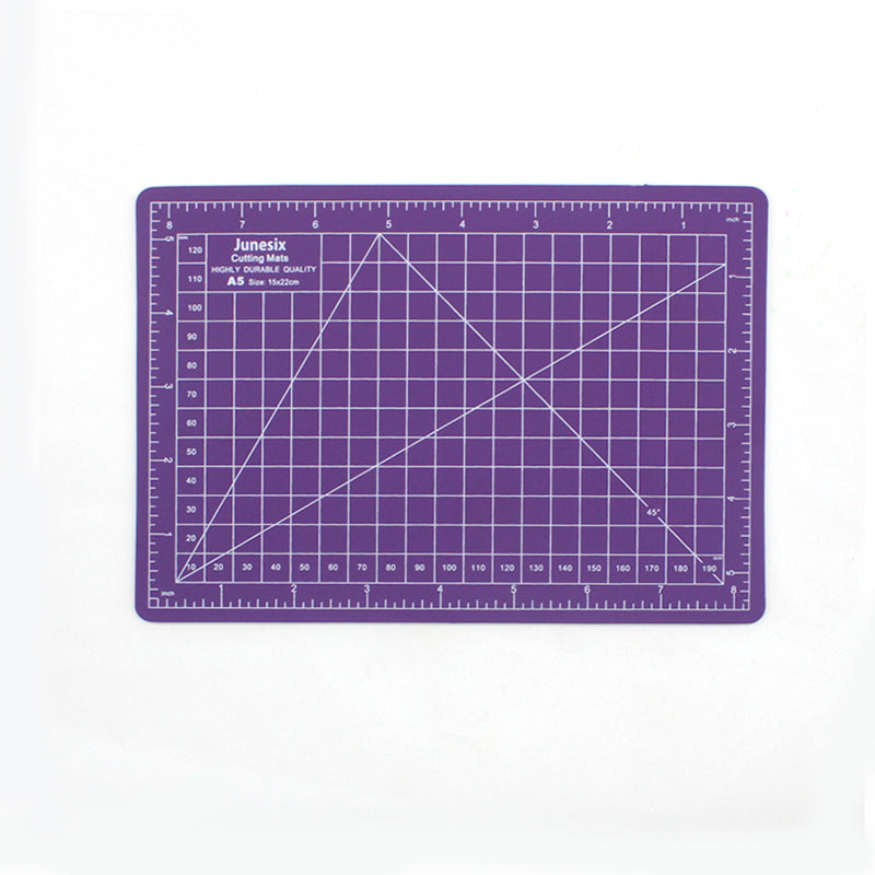 Purple A5 self-healing cutting mat with white measurement grid