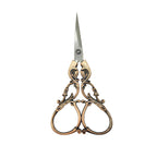 Red copper vintage scissors with bell flower and scrollwork handles