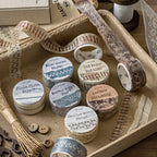 Vintage sewing stickers featuring thread spools, scissors and fabric patterns