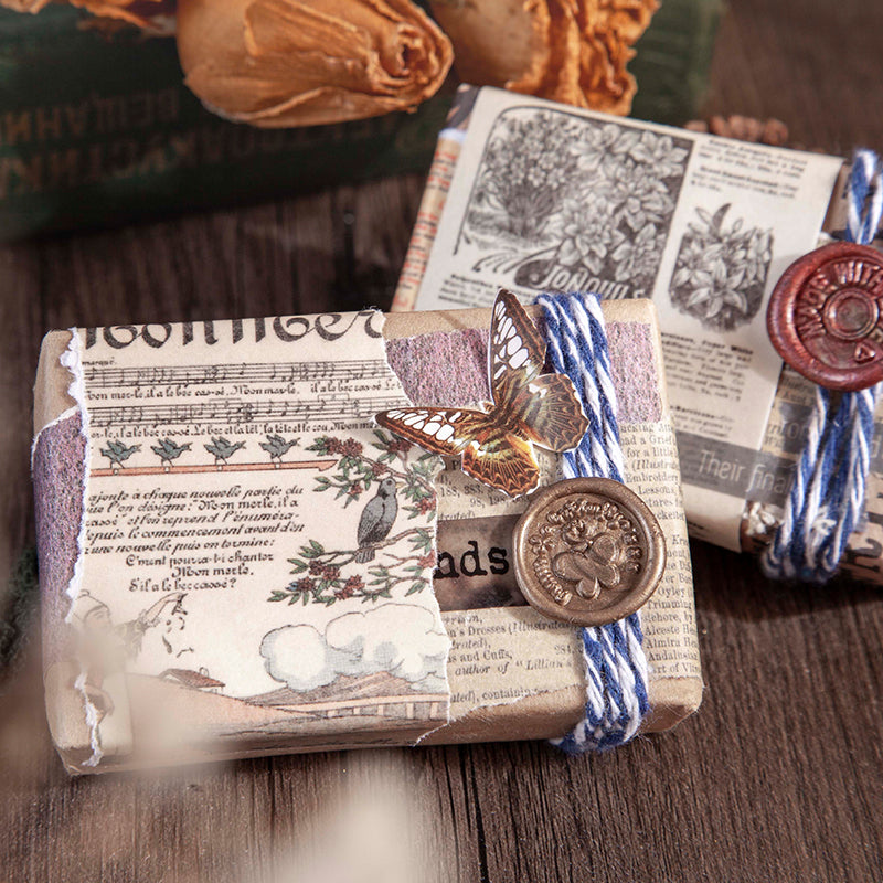 Display of retro pocket sticker book with nostalgic vintage designs for portable crafting
