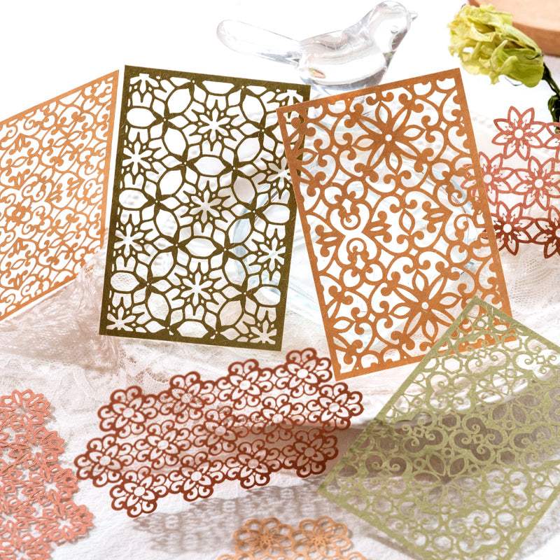 Romantic lace paper stickers with delicate cutwork designs for vintage-inspired journaling projects
