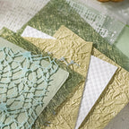 Sage green fishnet and gold crinkle textured specialty papers for botanical journal layouts