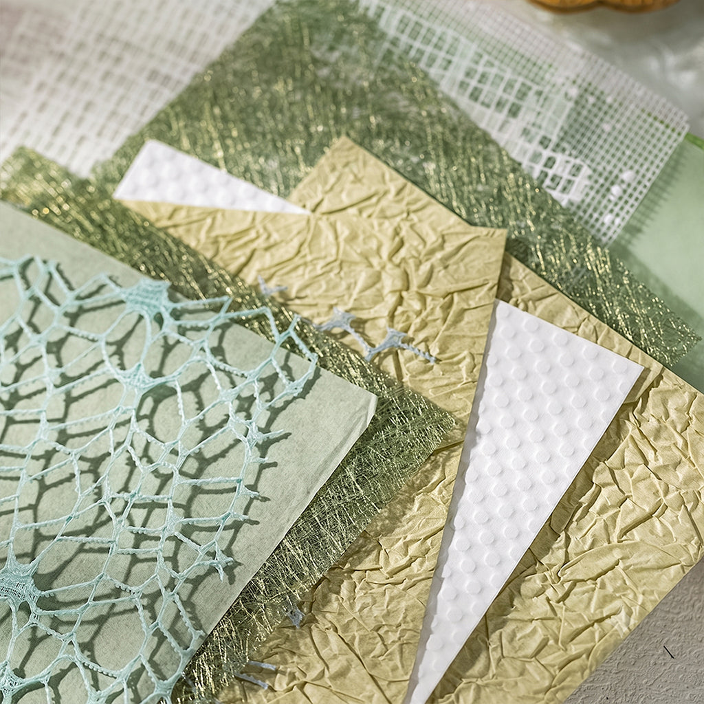 Sage green fishnet and gold crinkle textured specialty papers for botanical journal layouts