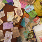 Colorful mini vintage papers scattered on a wooden desk