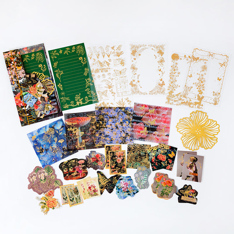 Green secret garden sticker set flat lay featuring floral frames and botanical elements for cottagecore journaling