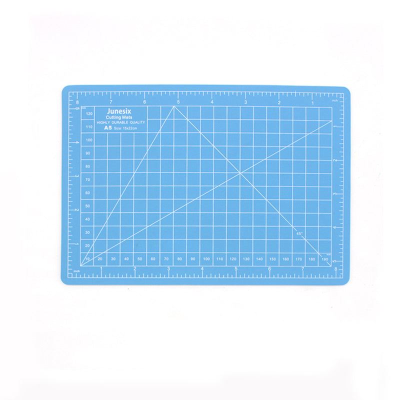 Sky blue A5 self-healing cutting mat with grid lines and rulers
