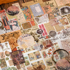 Dark desk scene with vintage specimen stickers and moon phases