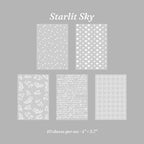 Navy embossed vellum paper scattered star relief midnight journal page layering effects