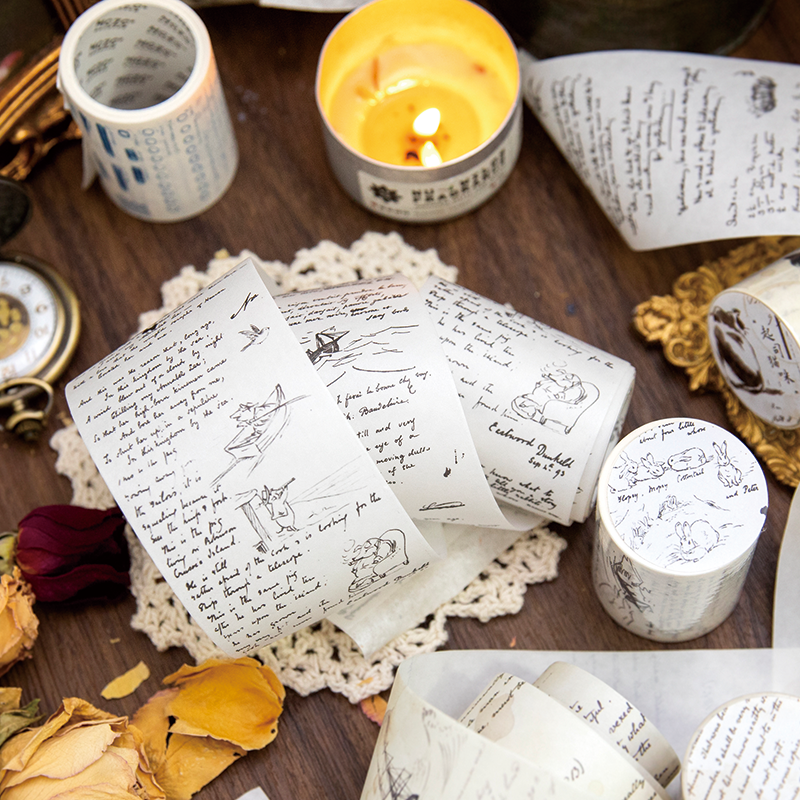 Storybook rabbit and sailboat washi tape with fairy tale handwriting on lace doily and candlelit desk