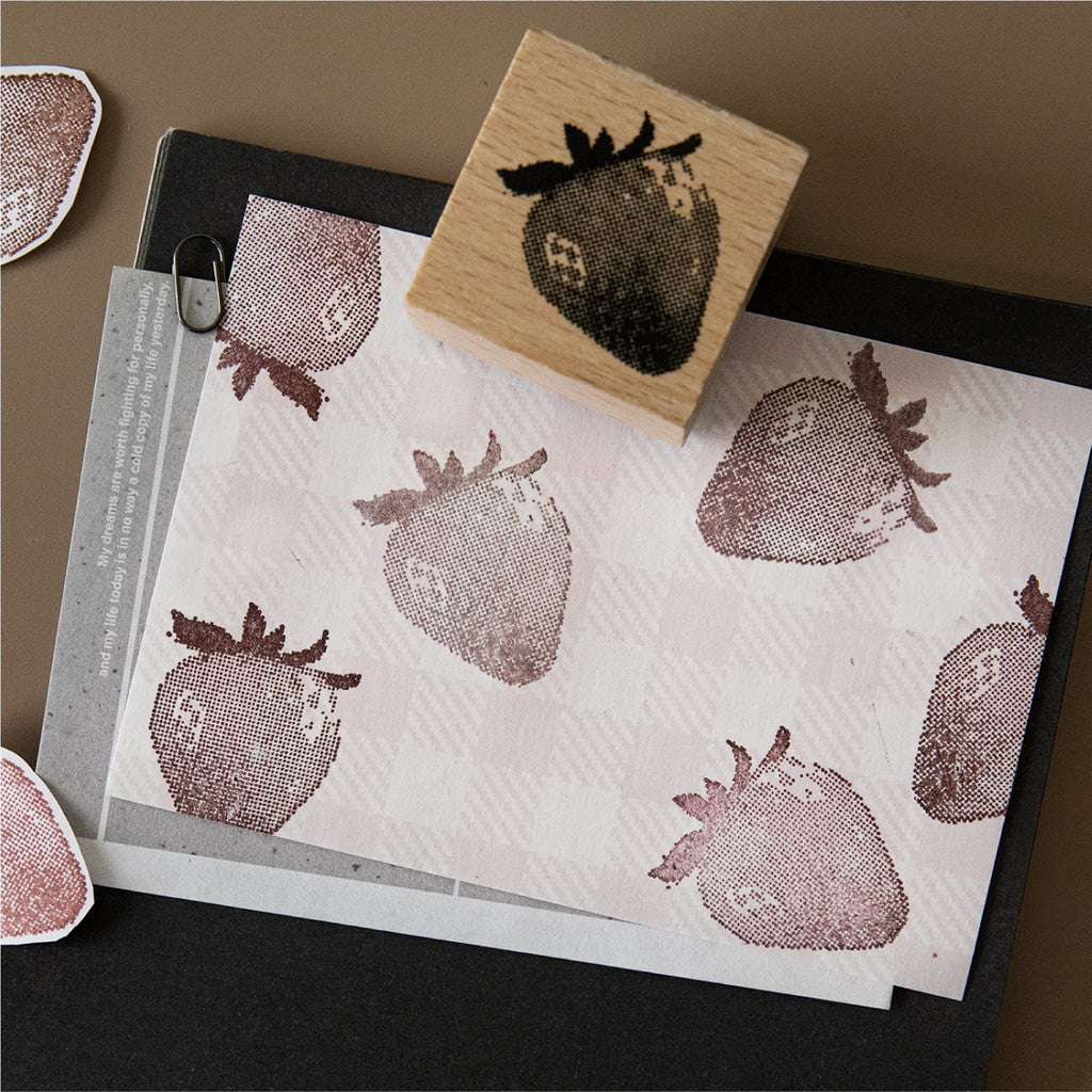 One Strawberry Stamp Impressions on Dark Paper
