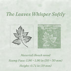 Vintage wooden rubber stamp The Leaves Whisper Softly variant showing carved autumn leaf stamp face and packaging card, 1.96 x 1.96 inch beech wood block for seasonal planner decoration
