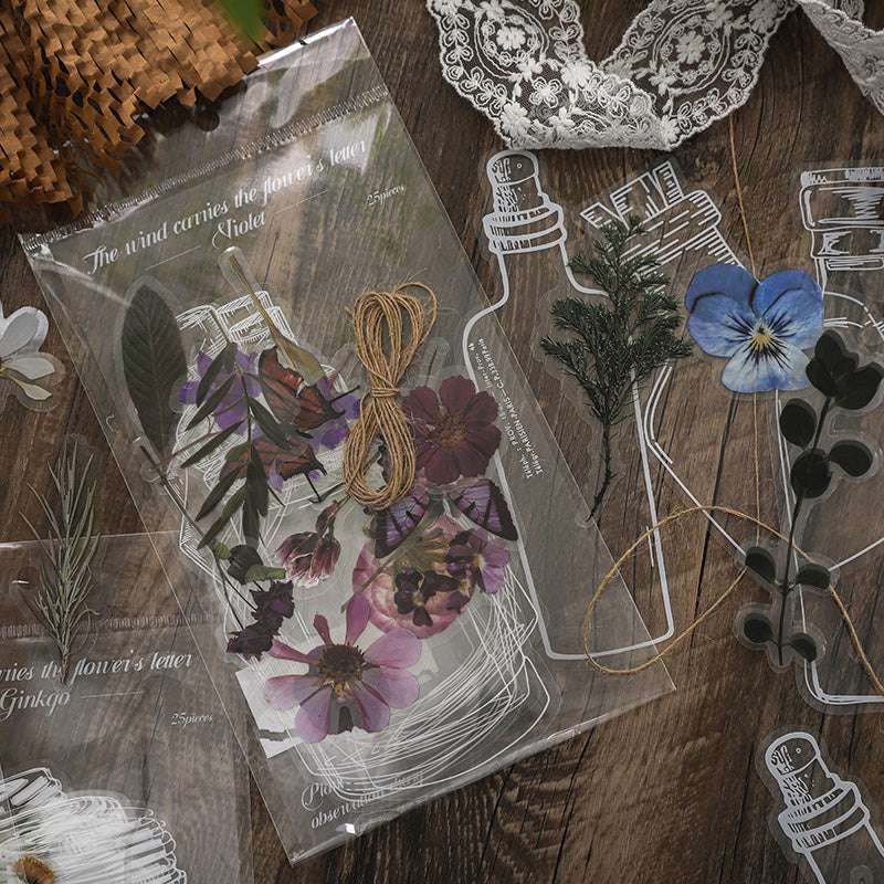 Close-up of translucent PET stickers showing waterproof floral letter designs for scrapbooking

