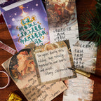 Translucent vellum sheets and kraft paper tags with snowman and holiday script for junk journal layering