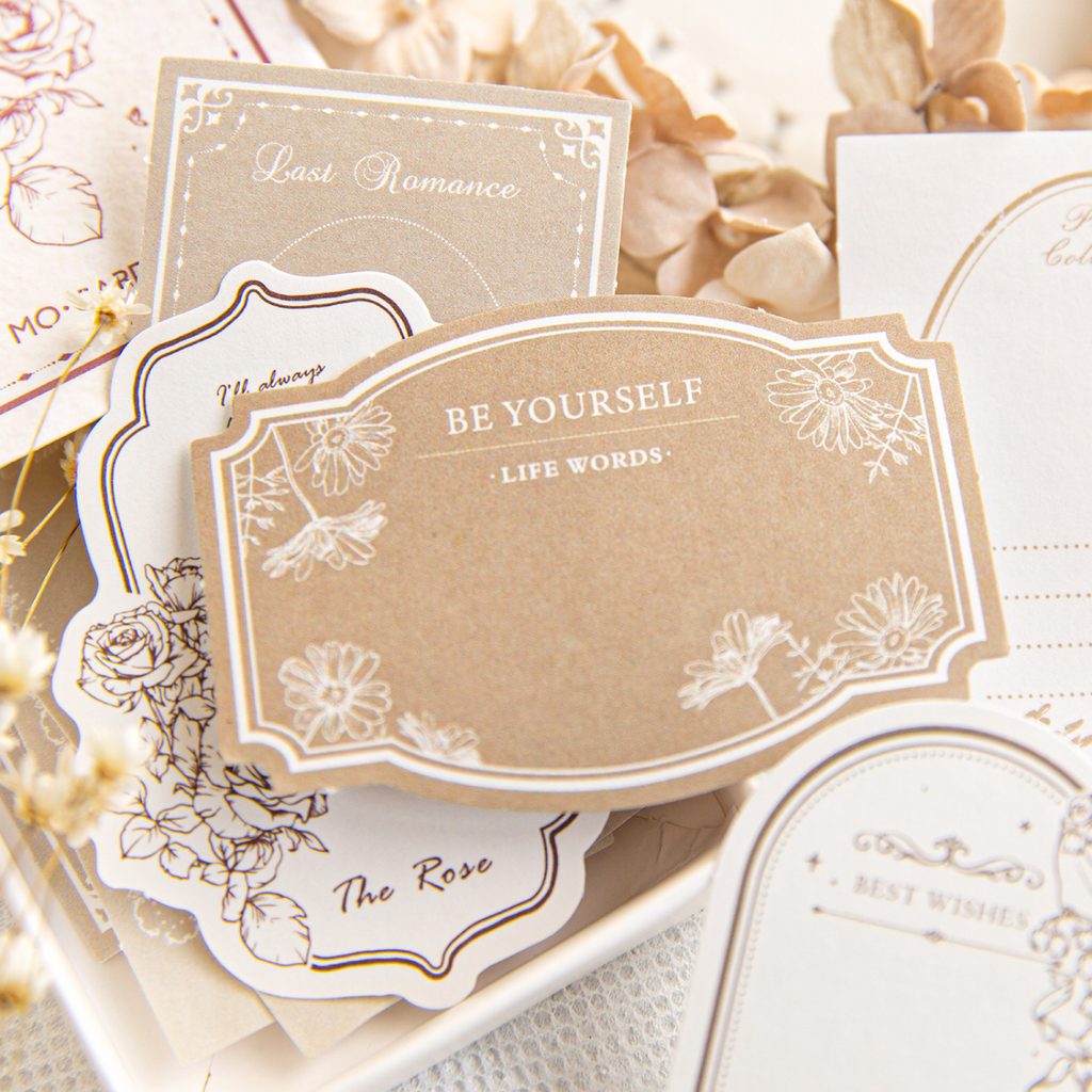  "Close-up of vintage floral memo stickers with retro border designs for planner decoration"