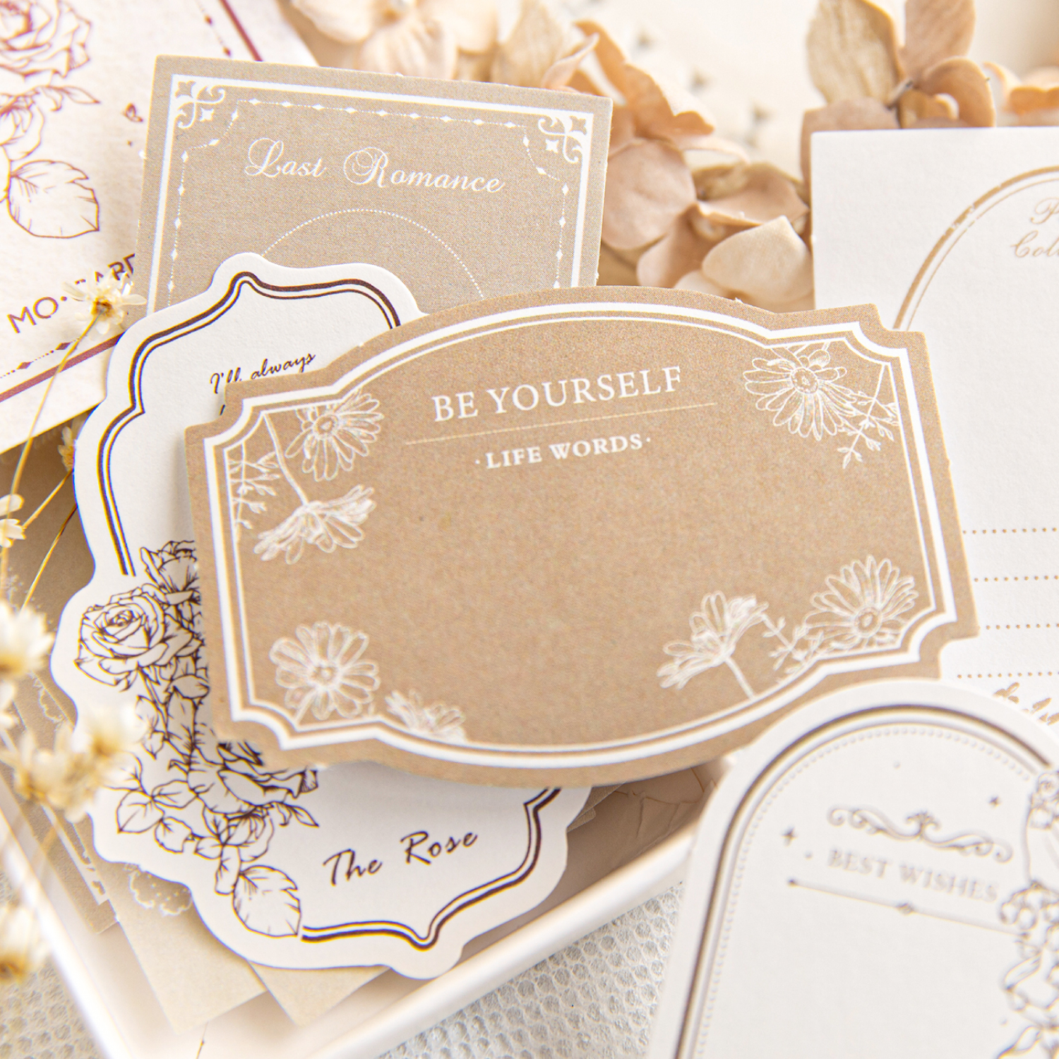  "Close-up of vintage floral memo stickers with retro border designs for planner decoration"