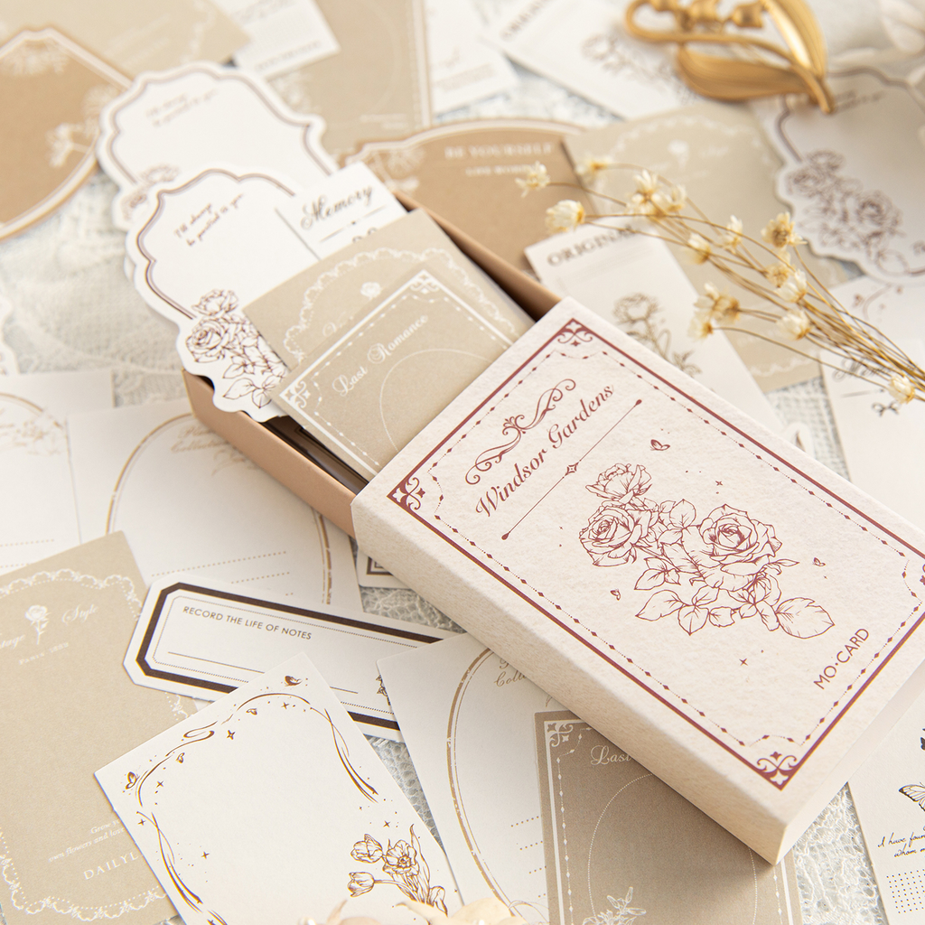 "Vintage matchbox memo pads arranged to show variety of retro border patterns"