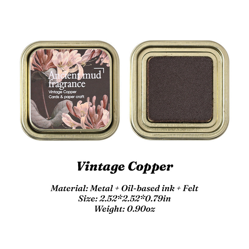 Vintage Copper oil-based ink pad in floral iron tin, lid and pad side by side