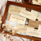 Close-up view of vintage English ephemera labels showing detailed designs and typography