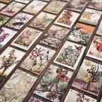 Detailed view of vintage mini cards perfect for scrapbooking and collage projects