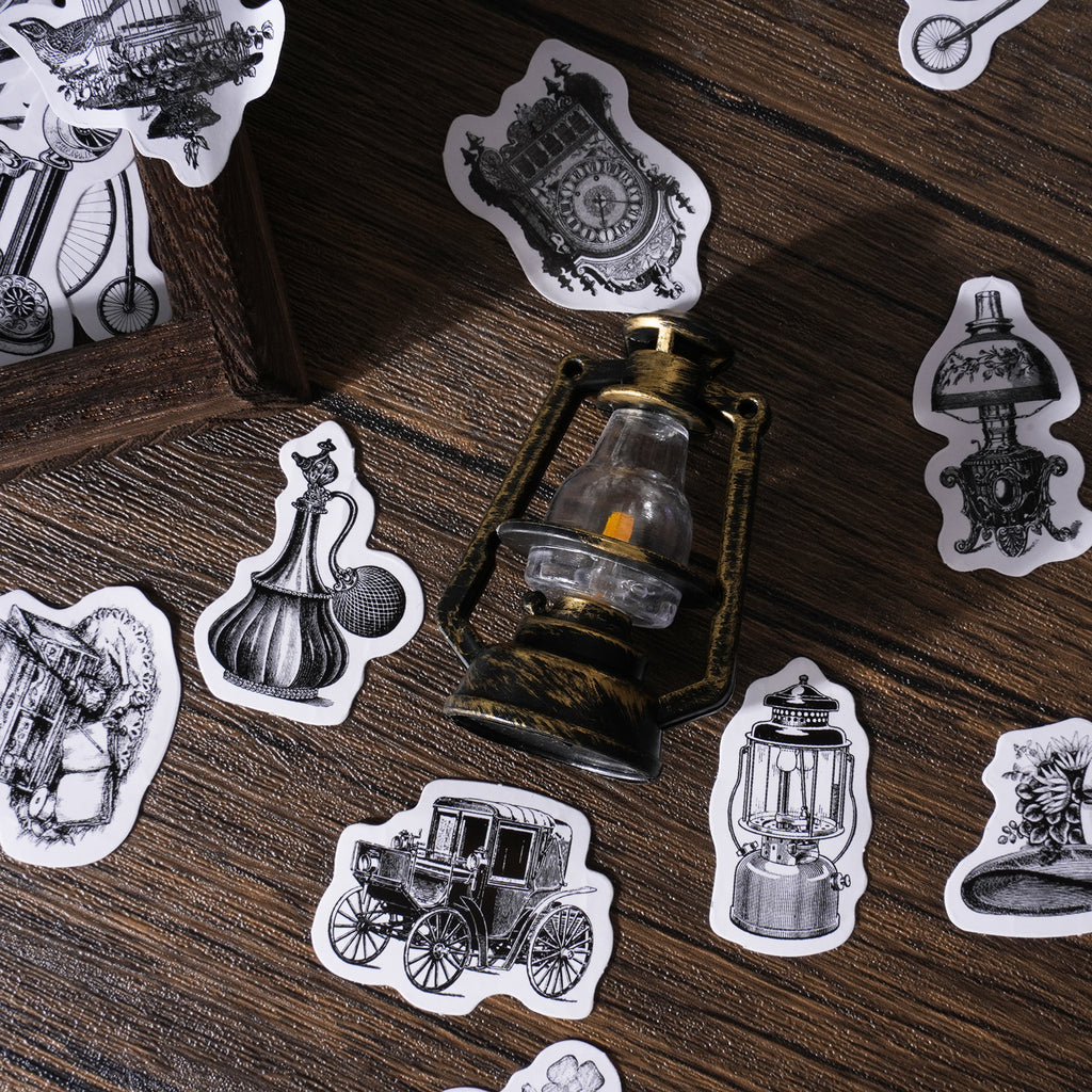 Black and white vintage sticker pack with retro camera and watch designs