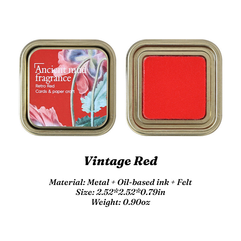 Vintage Red oil-based ink pad in floral iron tin, lid and pad side by side