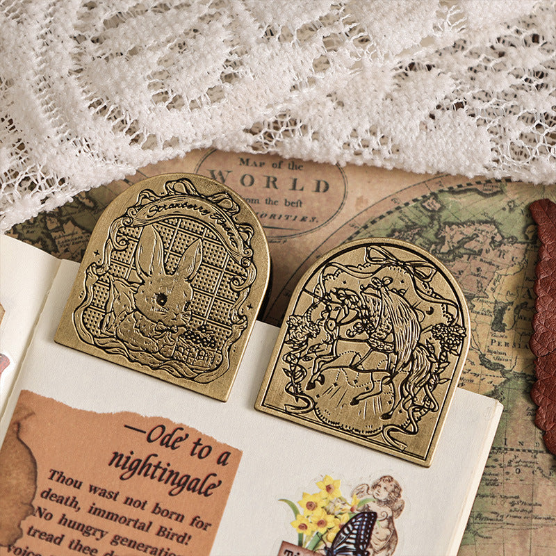 Vintage binder clips holding letters and ephemera on lace fabric