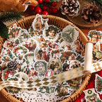 Vintage Christmas die cut sticker flakes in wicker basket with Victorian Santa holly and angel designs among pine cones